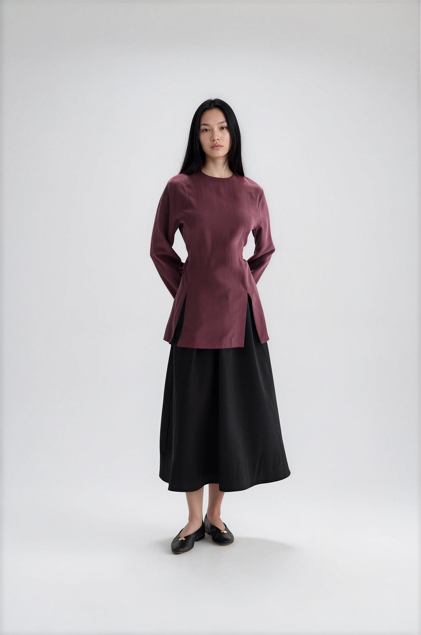 Elegante Bluse mit Seitenschlitzen